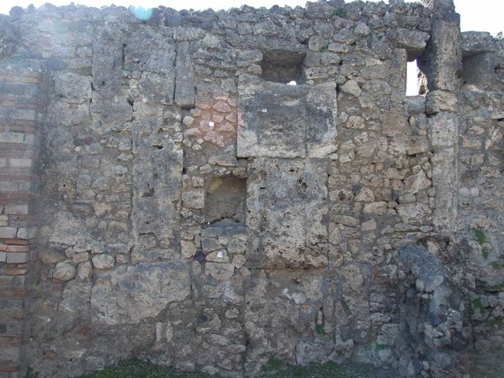V.3.6 Pompeii. March 2009. Shop room, West wall and arched Niche.