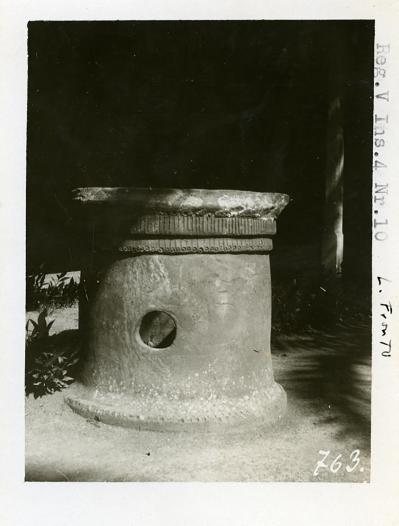 V.4.a Pompeii but shown as V.4.10 on photo.Pre-1937-39. Terracotta puteal.
Photo courtesy of American Academy in Rome, Photographic Archive. Warsher collection no. 763.