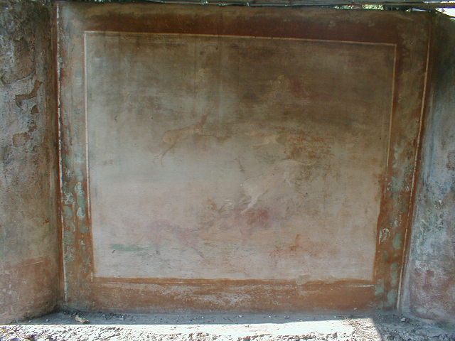 V.5.3 Pompeii. March 2009. Room 7, west side puteal, at beginning of wall at south end of peristyle.d.