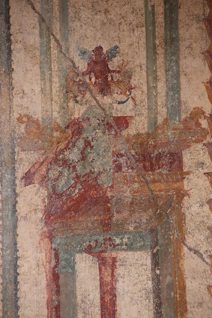 V.6.12 Pompeii. October 2024.
Cubiculum 9, detail of painted decoration on east wall. Photo courtesy of Klaus Heese.