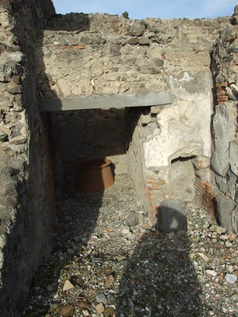 VI.1.7 Pompeii. December 2007. Room 24, baths� services area, looking north from room 28.
? area of steps to upper floor, possibly the ones bombed in 1943?
