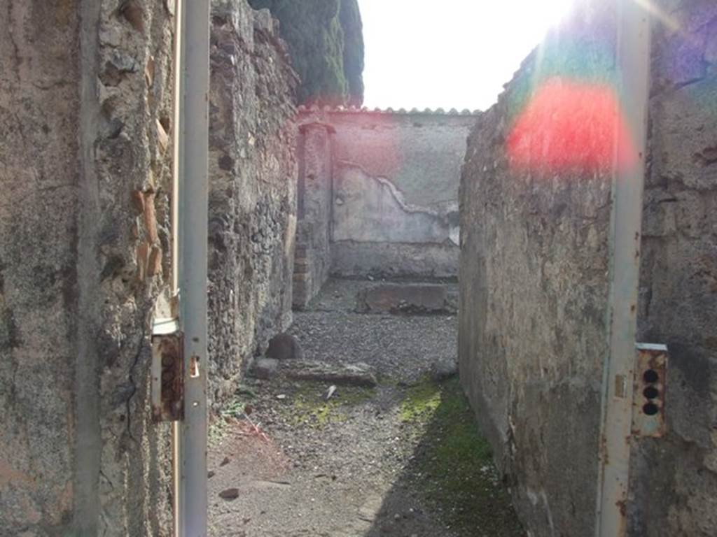 VI.1.7 House of the Vestals. Looking south from room 30 into corridor and rooms 35 and 36.