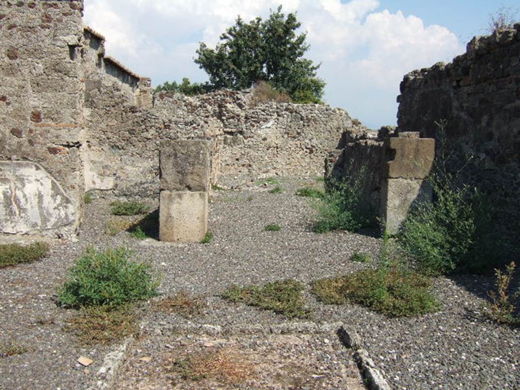 VI.2.12 Pompeii. September 2005. Corridor 4 on south side of tablinum, looking east to rear rooms.