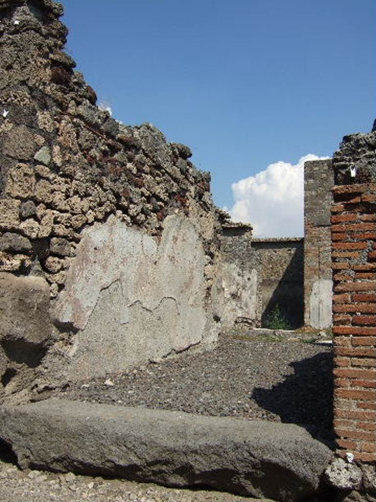 VI.2.13 Pompeii. September 2005. Looking east across atrium and impluvium to Tablinum.