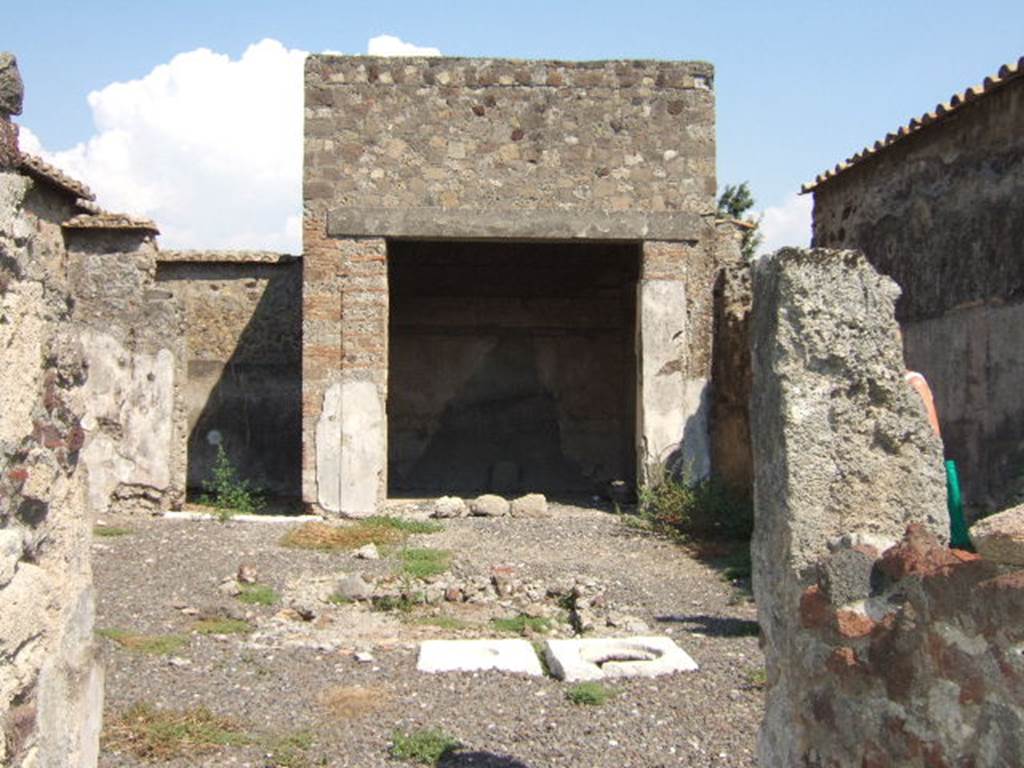 VI.2.13 Pompeii. September 2005. Impluvium and cistern mouth in atrium.