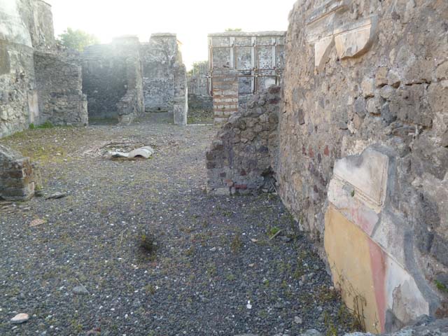 VI.2.17 Pompeii. September 2005. Two rooms on north side of atrium.
On the left is the site of stairs to upper floor, and the entrance to a triclinium, is on the right. See Eschebach, L., 1993. Gebäudeverzeichnis und Stadtplan der antiken Stadt Pompeji. Köln: Böhlau. (p.159)