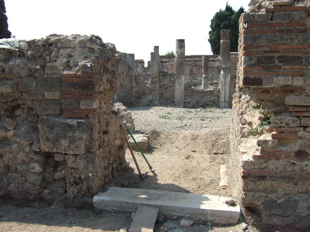 VI.2.19 Pompeii. December 2007. Looking west across excavations to a lower level, under the impluvium.