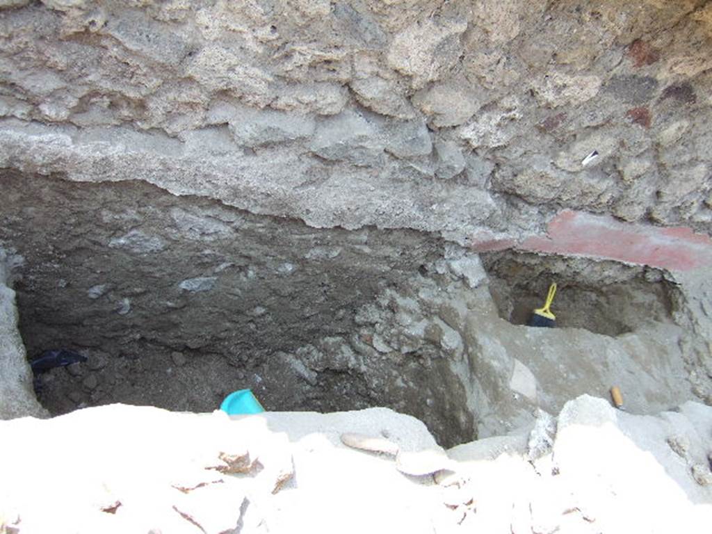 VI.2.20 Pompeii. September 2005. Excavation at base of exterior street wall in Vicolo di Modesto, between VI.2.19 and VI.2.20.