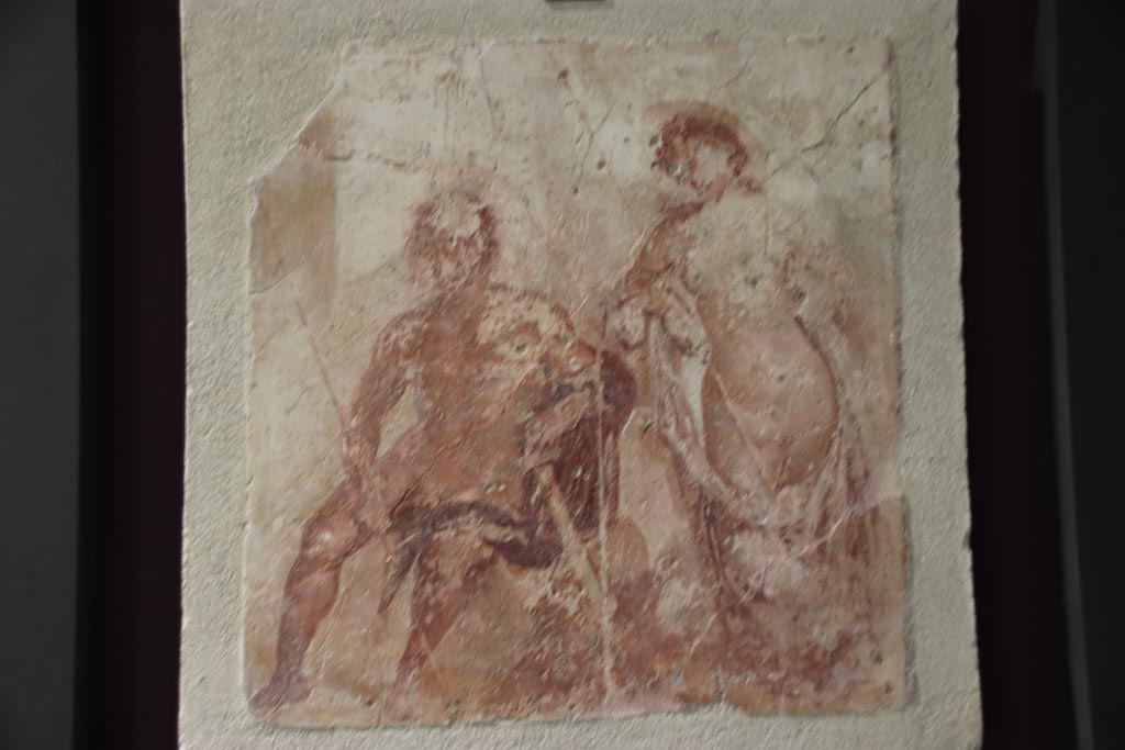 VI.2.22 Pompeii. October 2022.
Wall painting from centre of south wall of tablinum, Meleager and Atalanta, lovers resting after the hunt of the Calydonian boar.
Photo courtesy of Klaus Heese.