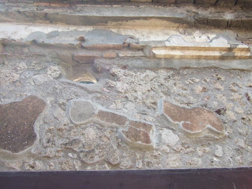 VI.2.22 Pompeii. December 2007. Painted wall decoration on west wall of peristyle, above doorway to triclinium.