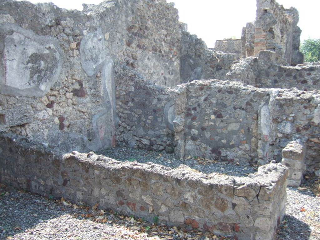 VI.2.27 Pompeii. September 2005. West wall of triclinium, with small cubiculum with antechamber on its west side.