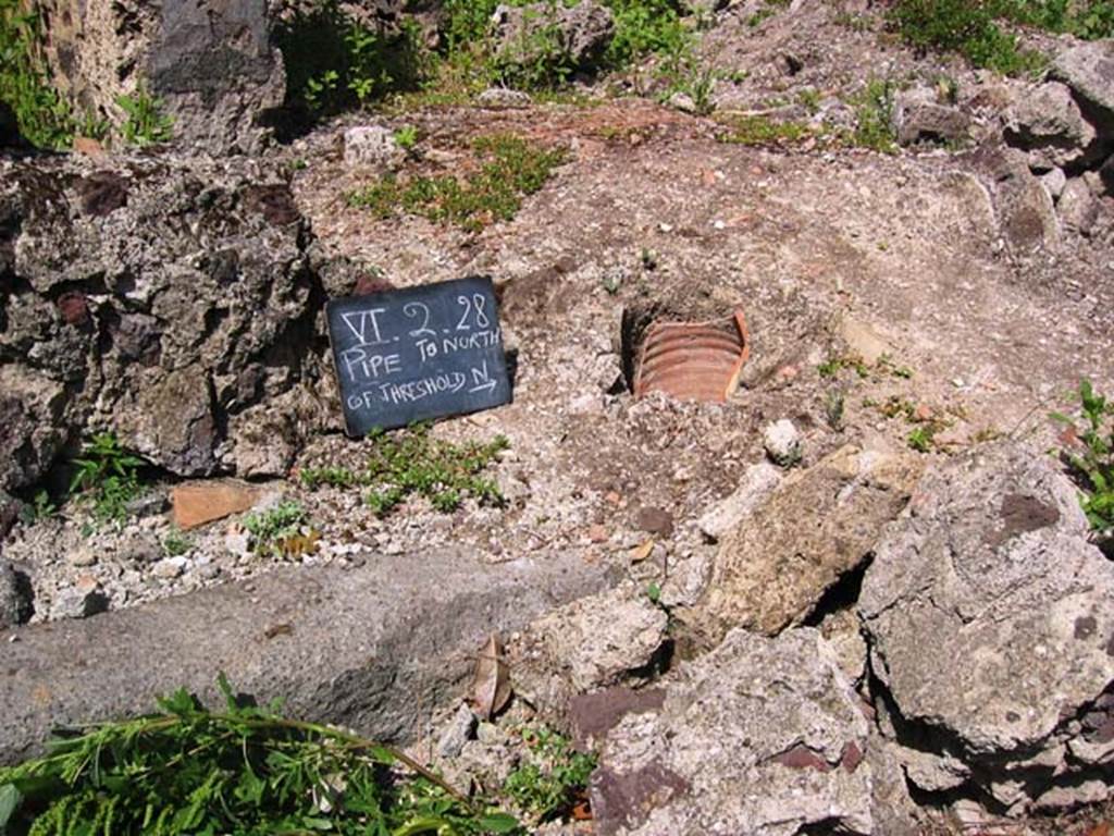 VI.2.28 Pompeii. September 2005. Looking north-west across atrium, with remains of impluvium. 

