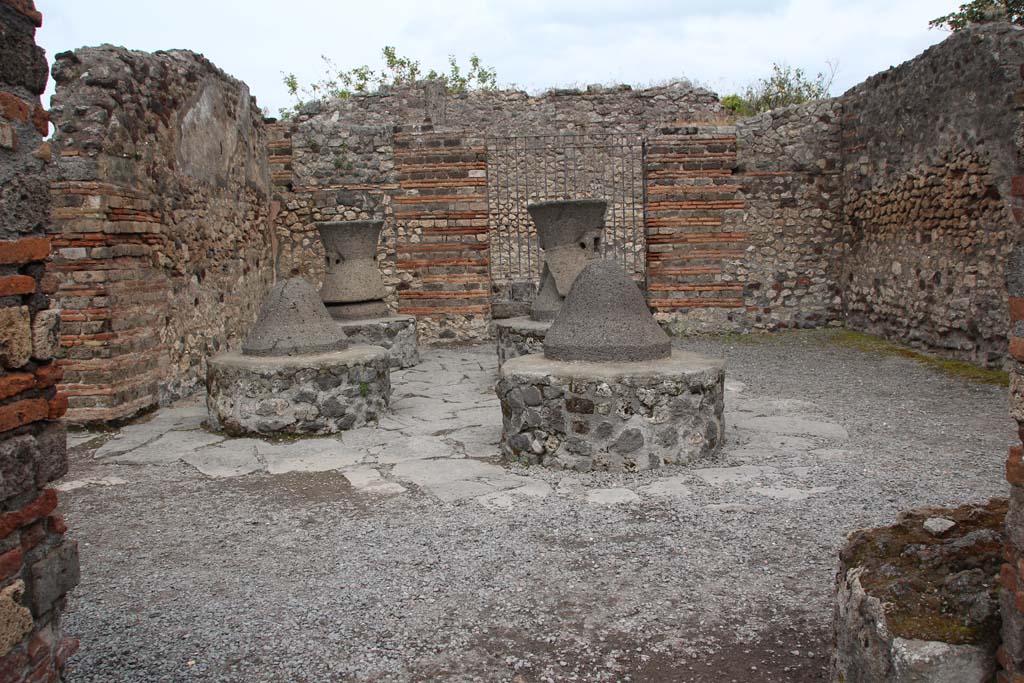 VI.3.3 Pompeii. April 2014. Room 7, looking east across mill-room towards entrance at VI.3.27.
Photo courtesy of Klaus Heese.