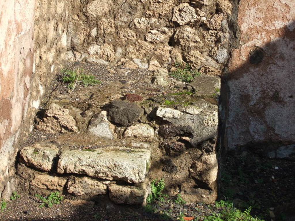 VI.3.6 Pompeii. December 2005. Steps to upper floor in north-east corner of shop. According to Eschebach and Hobson, there may have been a latrine nearby. See Eschebach, L., 1993. Geb�udeverzeichnis und Stadtplan der antiken Stadt Pompeji. K�ln: B�hlau. (p.163) See Hobson, B. 2009. Pompeii, Latrines and Down Pipes. Oxford, Hadrian Books, (p.196)
