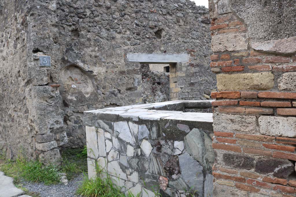 VI.4.3 Pompeii. December 2018.
Looking towards south wall with doorway linking to VI.4.4, from entrance doorway on Via Consolare. Photo courtesy of Aude Durand.