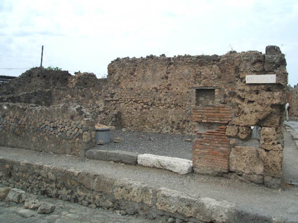 VI.4.9 Pompeii.  May 2005. Entrance doorway from Via delle Terme. According to Garcia y Garcia, this area was nearly all destroyed by the bombing in 1943.
The bomb provoked the total fall of the walls, internal and external onto Via Consolare, between the north wall and on its east side.
See Garcia y Garcia, L., 2006. Danni di guerra a Pompei. Rome: L�Erma di Bretschneider. (p.75)
