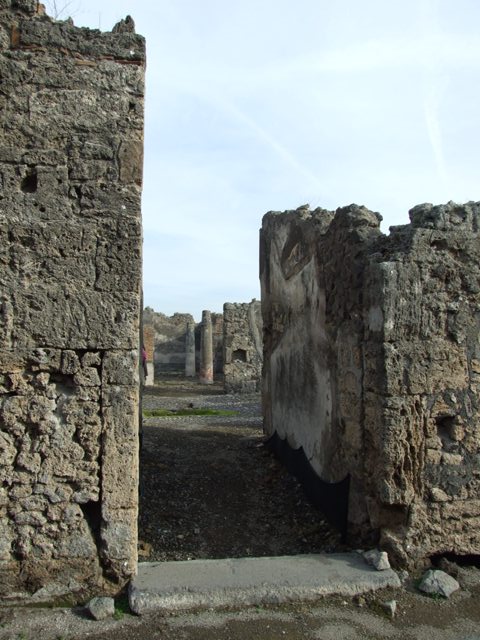 VI.5.5 Pompeii. December 2007. Exterior wall to north of entrance.