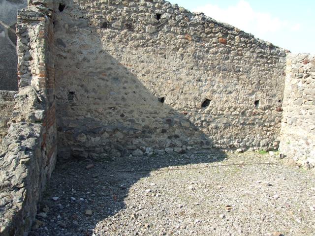 VI.7.3 Pompeii. March 2009. Room 6, north-east corner of garden area.
 According to Jashemski, there was a small garden at the rear of the house.
This was reached by a passageway on the right of the tablinum. The gutter along the north, east and south edges of the garden is now destroyed.
See Jashemski, W. F., 1993. The Gardens of Pompeii, Volume II: Appendices. New York: Caratzas. (p.129)
