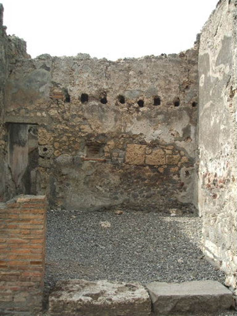 VI.7.5 Pompeii.  March 2009.  North wall with door to rear room.