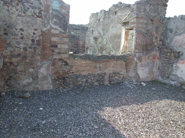 VI.7.6 Pompeii. March 2009. Room 10, east wall of triclinium, with remains of painted wall plaster.