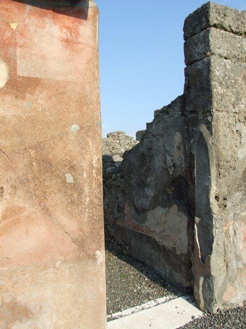 VI.7.6 Pompeii. March 2009. Room 14. North wall, with door to atrium.