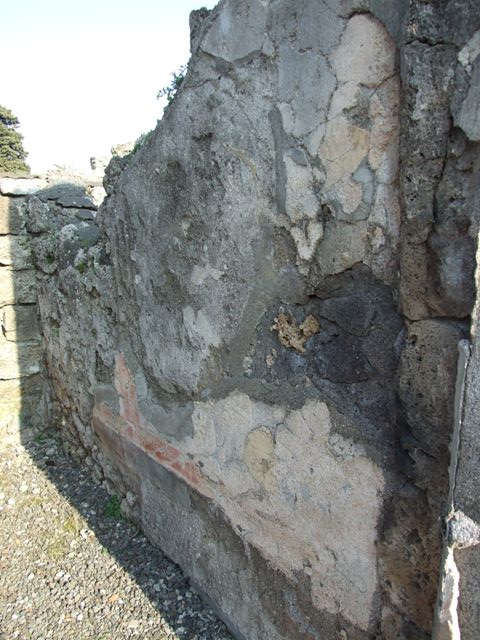 VI.7.6 Pompeii. March 2009. Room 14. West wall, with remains of site of staircase to upper floor.