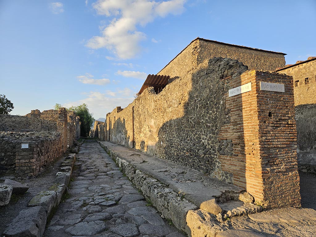 Vicolo della Fullonica, Pompeii. November 2024. 
Looking north along east exterior wall of VI.8.4, on right. Photo courtesy of Annette Haug.
