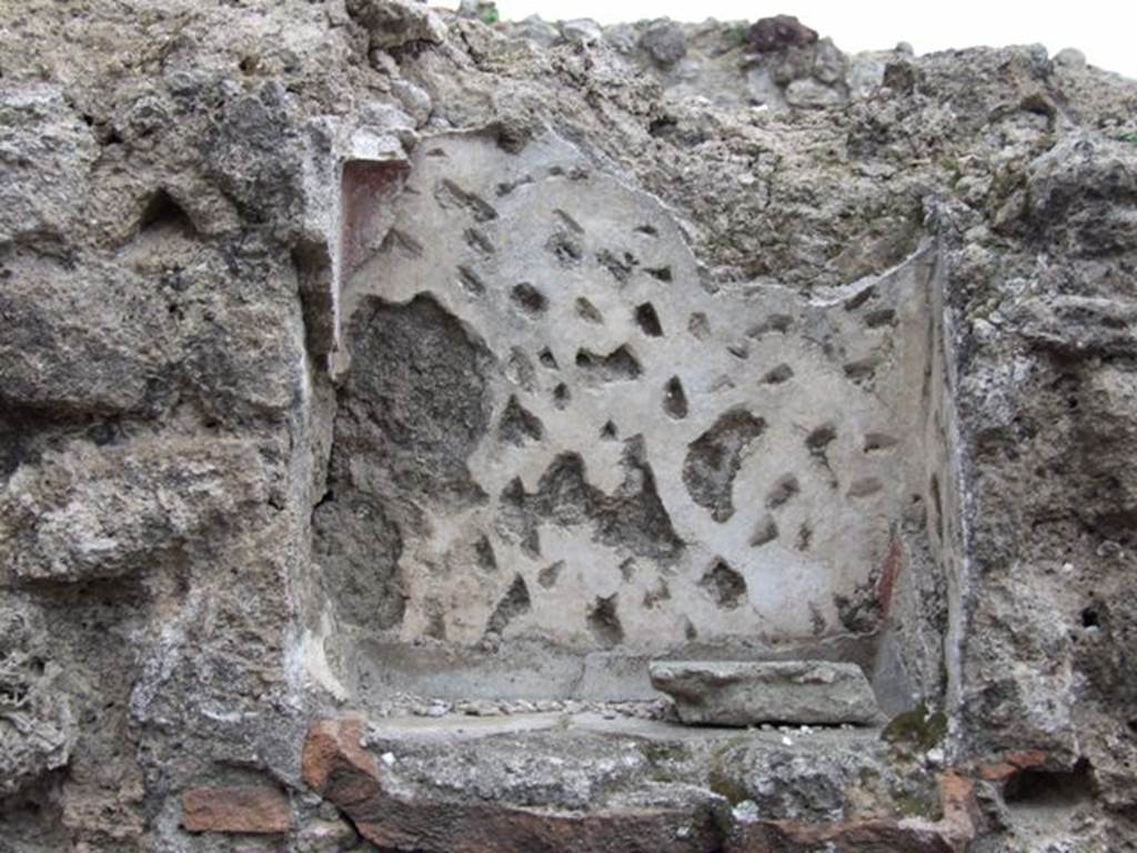 VI.8.8 Pompeii.  December 2007.  Niche on east wall of rear room.
According to Boyce, the inside walls were decorated with red lines and spots on a white background, its floor projected like a narrow shelf. Fiorelli called it �la nicchia dei Penati�.  See Boyce G. K., 1937. Corpus of the Lararia of Pompeii. Rome: MAAR 14.  p49 ( no.169)
