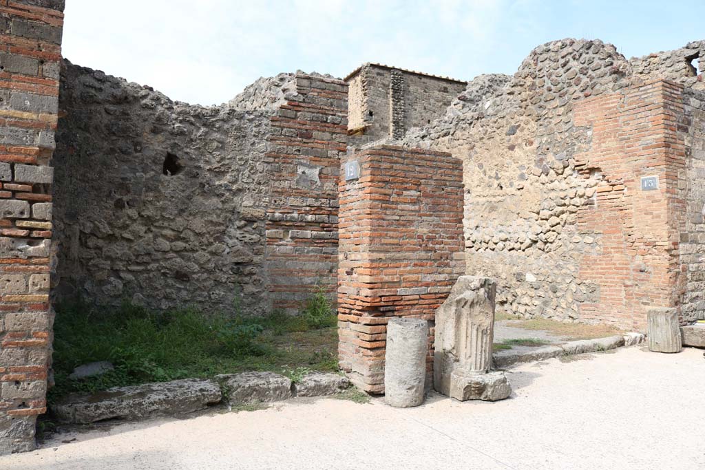 VI.8.12 Pompeii, on left. December 2018.
Looking towards entrance doorways on west side of Via di Mercurio, with VI.8.13, on right. Photo courtesy of Aude Durand.