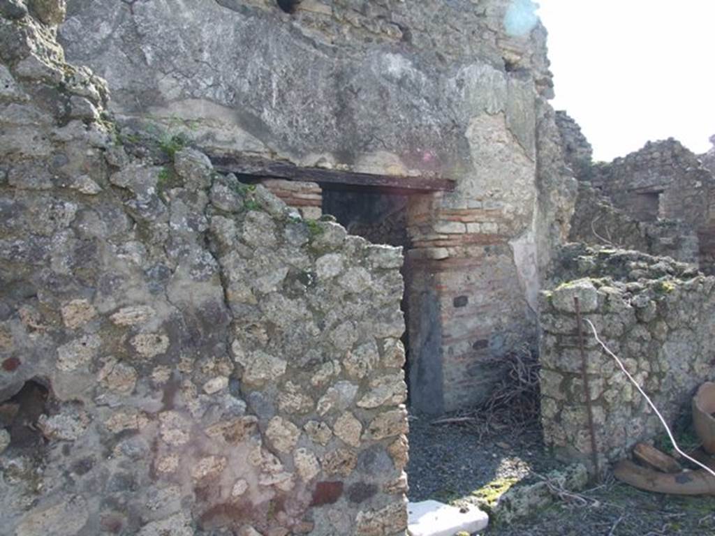 VI.8.20 Pompeii. March 2009. Doorway into room 14 from peristyle.