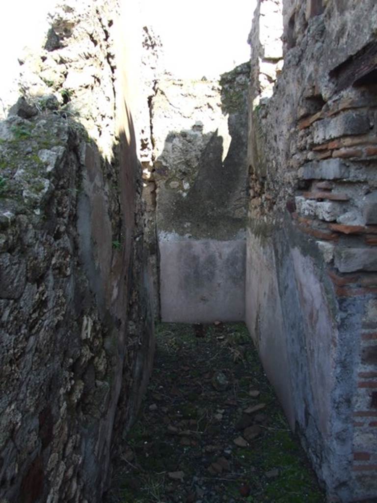 VI.8.20 Pompeii. March 2009. Room 13. Looking east from doorway into Room 16. The site of the stairs to the upper floor is visible in the plaster on both side walls.