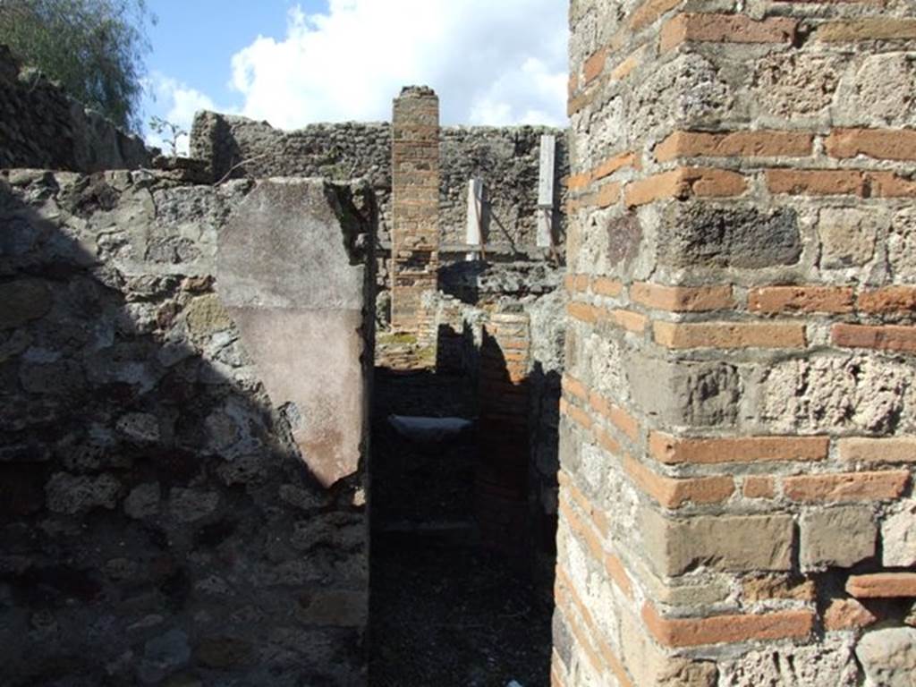 VI.8.20 Pompeii. March 2009. Looking north along front of vats on west side of peristyle.