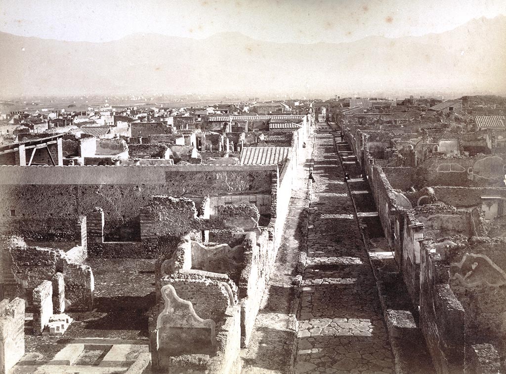 VI.9.1 Pompeii, on left. Late 19th century photograph by Sommer, numbered 1200. Looking south along Via Mercurio.
On the left is the atrium with impluvium and base of money-chest. Photo courtesy of Espen B. Andersson.