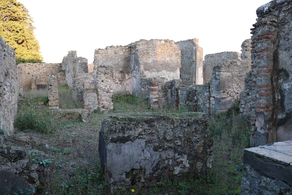 VI.10.3 Pompeii. December 2018. Looking south-east from bar-room towards dwelling at VI.10.4, at rear. Photo courtesy of Aude Durand.