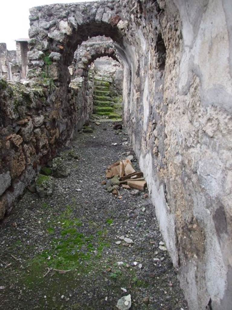 VI.10.7 Pompeii. March 2009. Room 15. Garden area. South side. Corridor at rear of fountains looking west.