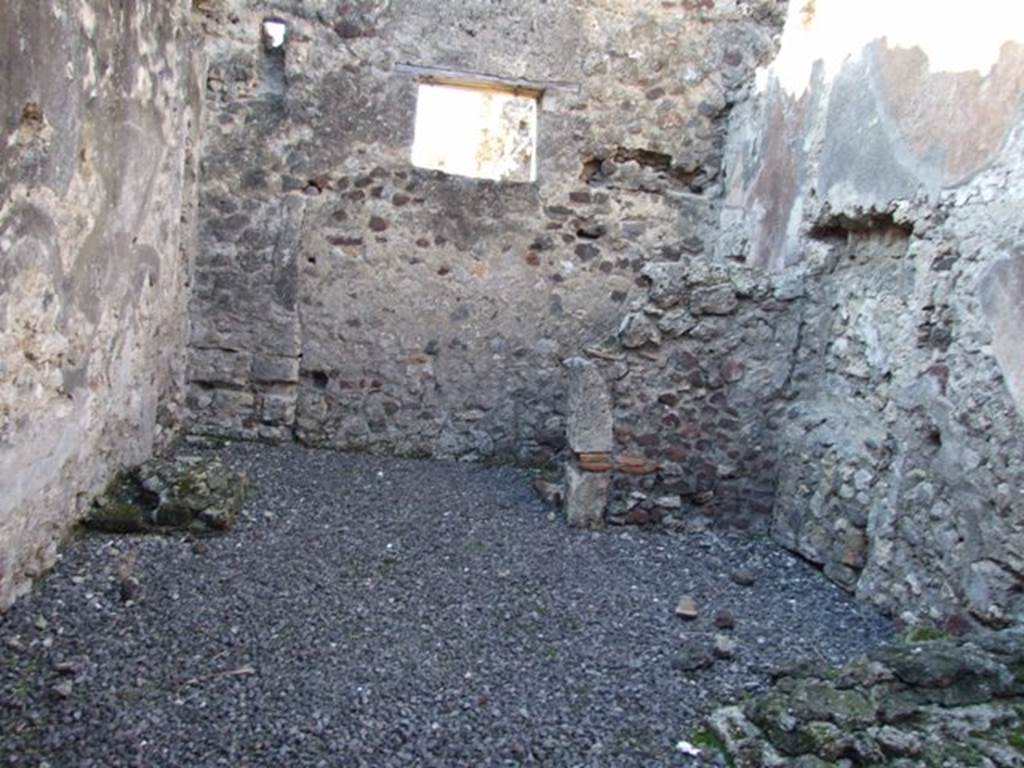 VI.11.8 Pompeii. December 2007. Room 56, looking west.
Against the north wall, on right, would have been the stairs to the upper floor, and in the north-west corner under the stairs is the latrine. On the left, against the south wall was probably a hearth or a bench.
