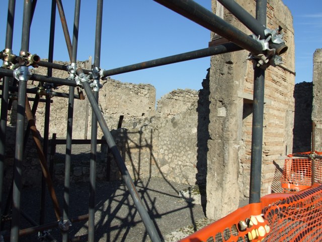 VI.13.3 Pompeii. December 2007. West wall of shop, behind scaffolding , and north-west corner of shop.