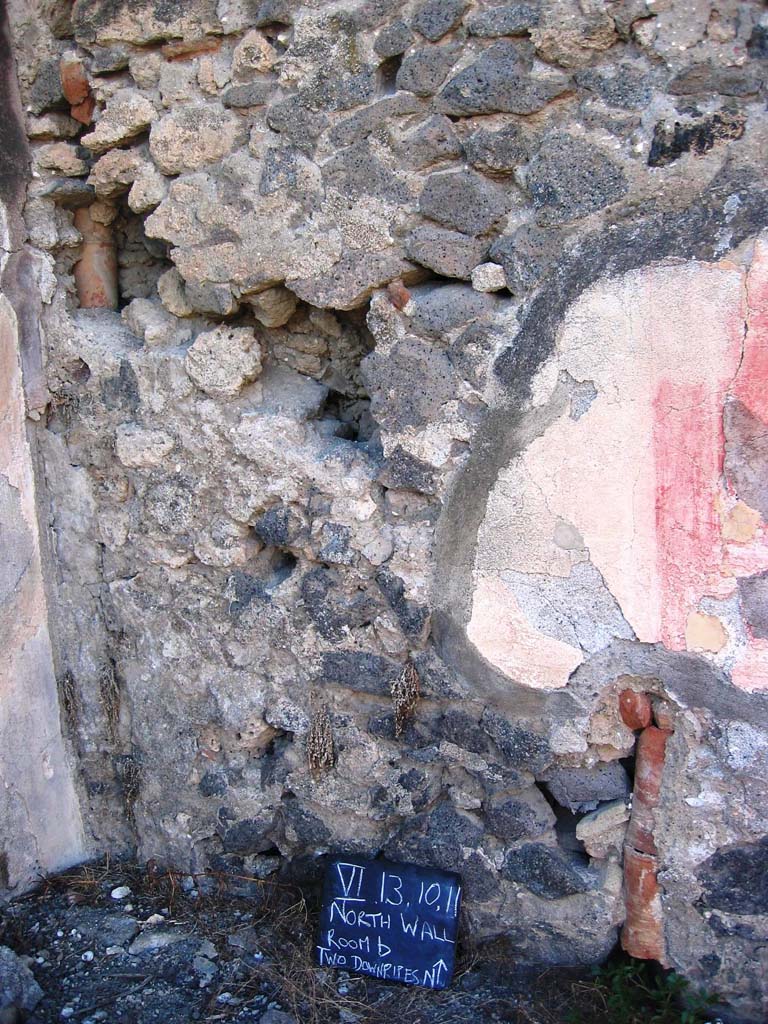 VI.13.10 Pompeii. July 2008. 
North-west corner of atrium, north wall with two downpipes. Photo courtesy of Barry Hobson.
