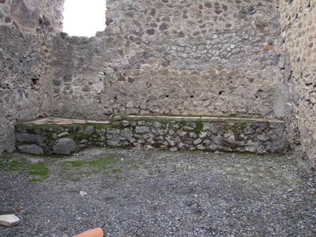 VI.13.14 Pompeii. December 2007. South wall and south-west corner with possible steps to upper floor in front of blocked door.
