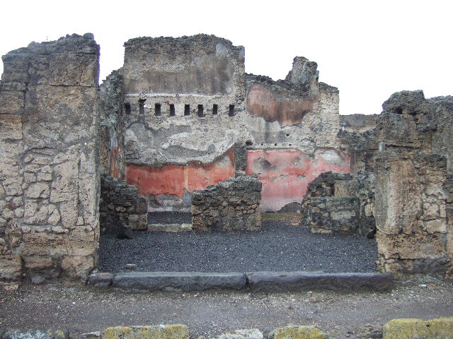 VI.14.8 Pompeii. December 2006. Doorway to small room on right side, with stairs to upper floor ? According to Helbig, visible in the second rear room on the left was an unclear painting. See Helbig, W., 1868. Wandgemälde der vom Vesuv verschütteten Städte Campaniens. Leipzig: Breitkopf und Härtel. (1387b). According to Fiorelli, the painting perhaps showed two litigants in the presence of a magistrate? See Pappalardo, U., 2001. La Descrizione di Pompei per Giuseppe Fiorelli (1875). Napoli: Massa Editore. (p.157). According to Eschebach, this may also have been known as the “Casetta dei Litiganti”, presumably named from the painting. See Eschebach, L., 1993. Gebäudeverzeichnis und Stadtplan der antiken Stadt Pompeji. Köln: Böhlau. (p.209)