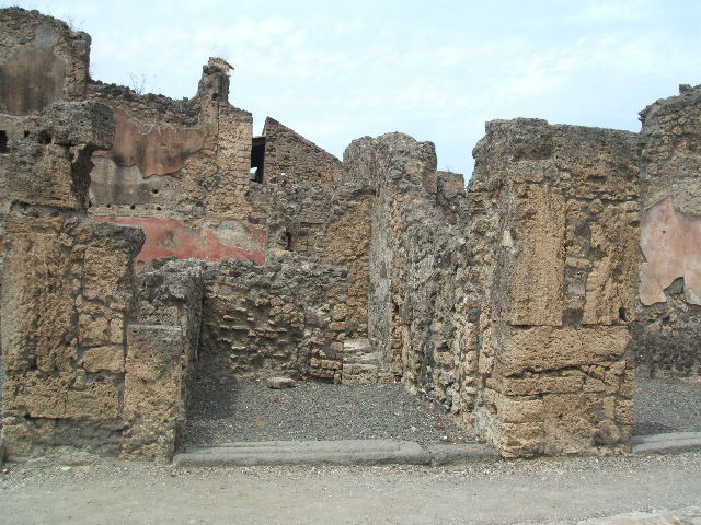 VI.14.9 Pompeii. December 2006. Looking north from entrance, across kitchen and latrine.