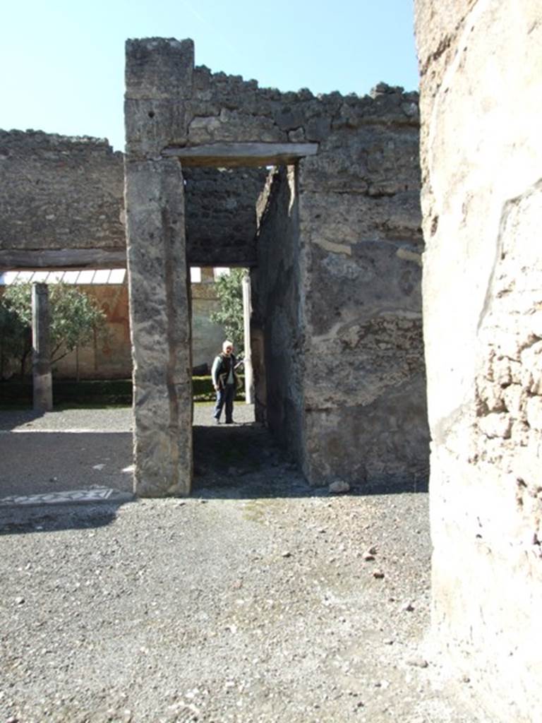 VI.14.20 Pompeii. March 2009. Looking west across atrium to room 5, corridor to rear of house.