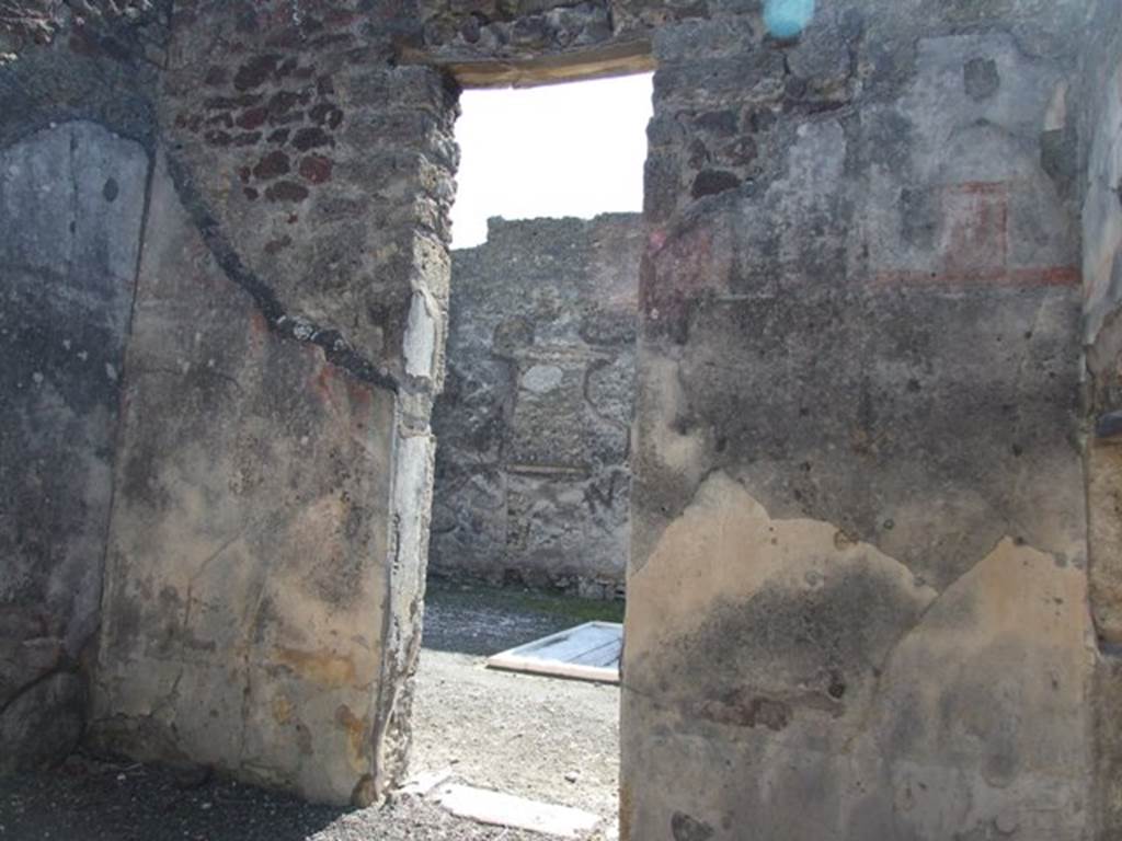 VI.14.20 Pompeii. March 2009. Room 7. South wall with door to atrium.