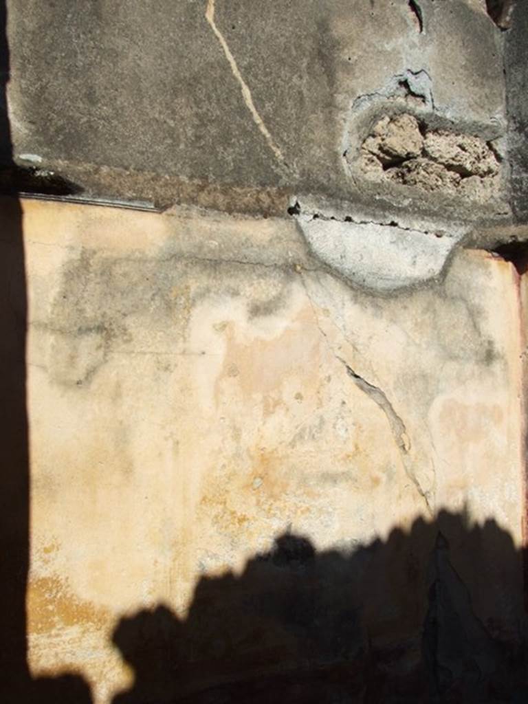 VI.14.20 Pompeii. March 2009. Room 9, north wall.
According to PPM – (room e) -
North wall; red panelled zoccolo with painted plants at the sides and Ibis (disappeared) in the centre (disappeared): the middle zone, nearly all faded, had an aedicula in the centre with a painting of a crowned Dionysus, talking to a crowned female figure, to the sides semi-panels with “carpet borders“ and corner volutes, at the top of the wall was a stucco cornice with palmettes. IV Style.
See Carratelli, G. P., 1990-2003. Pompei: Pitture e Mosaici: Vol. V. Roma: Istituto della enciclopedia italiana, p.269, no.6.
According to Sogliano: cubiculum on the right of the entrance corridor, (height: 0.52 x length: 0.42).
In the middle stands crowned Dionisus with his right elbow resting on a base or pillar and with the thyrsus in the left hand. On the right you can see a female figure, also crowned, who is talking to him by putting, as it seems, the right hand/arm on the shoulder.
See Sogliano, A., 1879. Le pitture murali campane scoverte negli anni 1867-79. Napoli: Giannini, (p.40, no.166).
(cubicoli a destra dell’androne –
Nel mezzo sta in piedi Dioniso coronato col gomito destra appoggiato ad una base o pilastri e col tirso nell sinistro. A destra si vede una figura muliebre, pure coronate, che a lui si rivolge mettendogli, come pare, la destra sulla spalla.
Giorn.Scavi Pomp., n.s.III, p.100. Bull. Inst, 1876, p.20.).
Kuivalainen comments –
“Young Bacchus with either Venus or Ariadne on account of the crown, in the latter’s case pertaining to the wedding diadem, the future corona borealis.
See Kuivalainen, I., 2021. The Portrayal of Pompeian Bacchus. Commentationes Humanarum Litterarum 140. Helsinki: Finnish Society of Sciences and Letters, (p.126, D3).