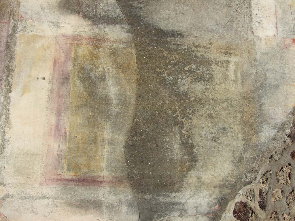 VI.14.20 Pompeii. March 2009. Room 10, remains of painted bird decoration and plants, on east wall of triclinium.
