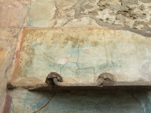 VI.14.20 Pompeii. March 2009. Room 18, detail of the Lyre from west wall of garden area.