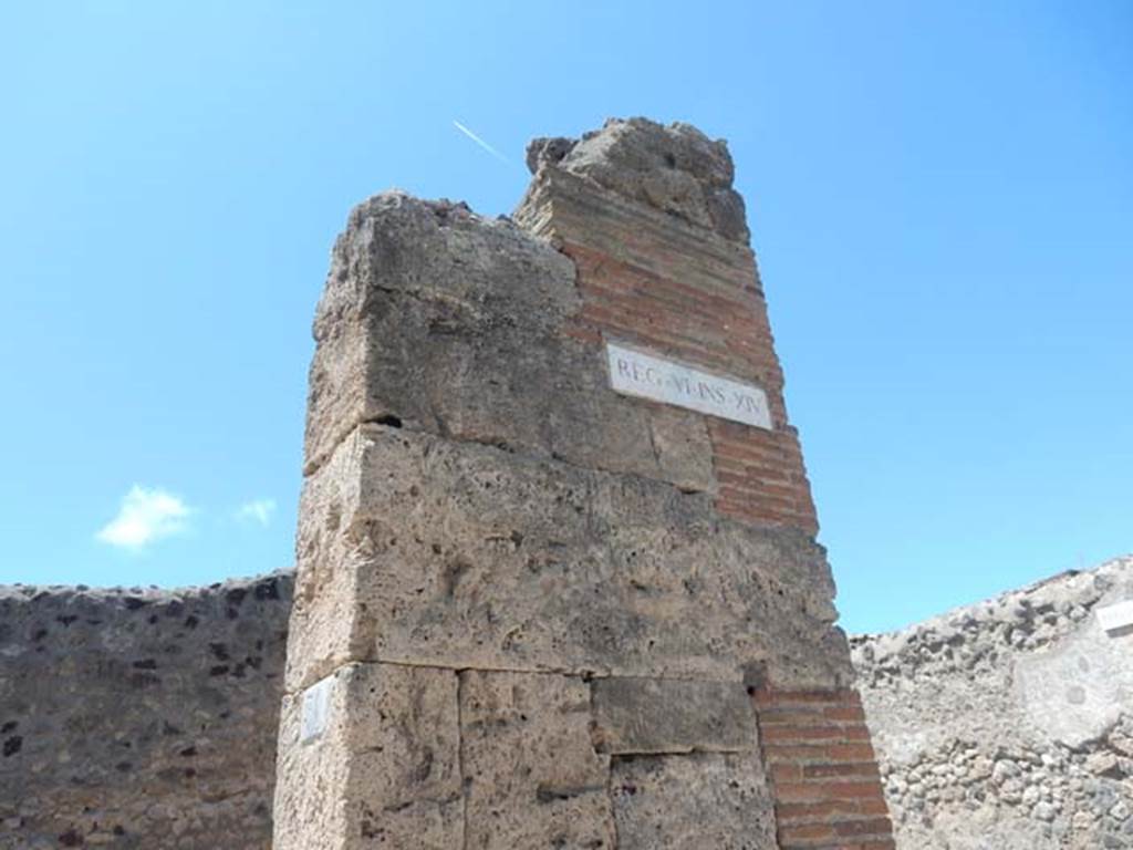 VI.14.31 Pompeii. May 2017. Looking towards pilaster on north side of entrance doorway. This is the north-east corner of the insula. Photo courtesy of Buzz Ferebee.