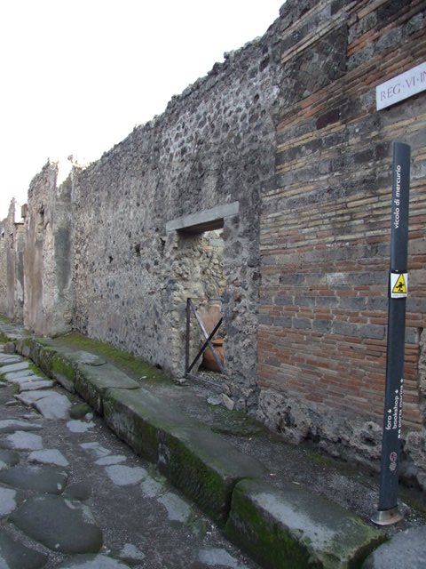 VI.14.35 Pompeii. December 2007. Looking south towards two doorways in east wall of caupona. 
