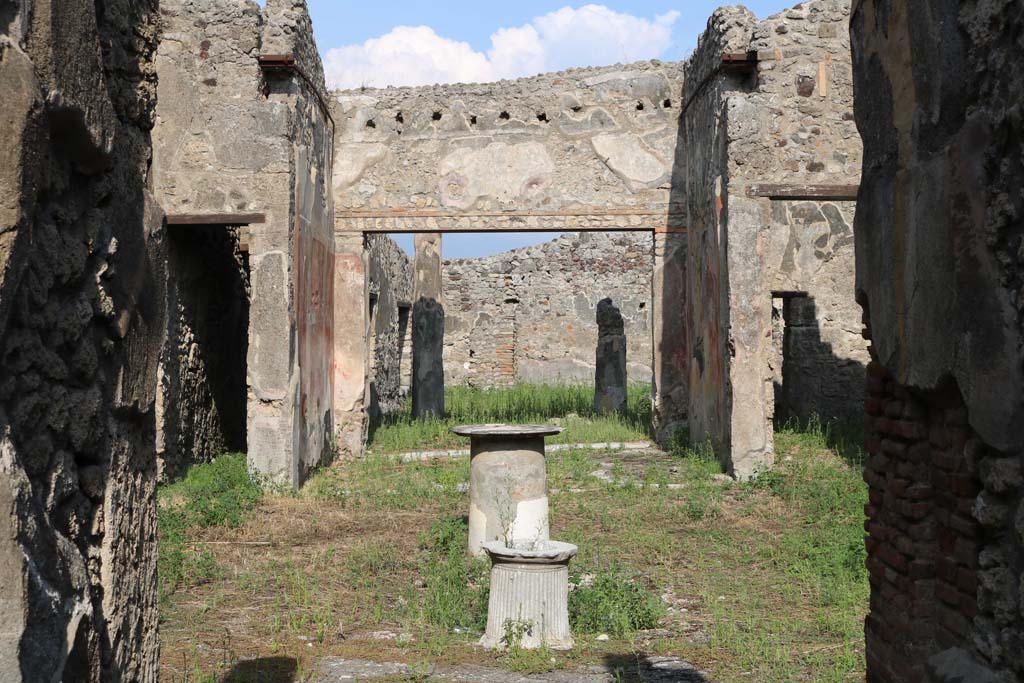 VI.14.40 Pompeii. December 2007. Double niche on north wall of atrium.
According to Boyce, at the extreme east end of the north wall of the atrium, are two vaulted niches, side by side. Above them both is a single pediment formed of projecting tiles. See Boyce G. K., 1937. Corpus of the Lararia of Pompeii. Rome: MAAR 14. (p. 54, no.207, with Pl.4,6)