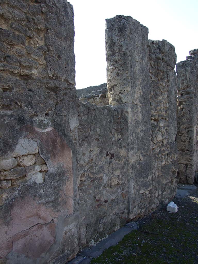 VI.14.43 Pompeii. December 2007. Blocked door on south side of atrium between rooms 9 and 10.
According to Bragantini, the south wall of the atrium would have had a black dado, the middle area would have been red with bordered panels.
See Bragantini, de Vos, Badoni, 1983. Pitture e Pavimenti di Pompei, Parte 2. Rome: ICCD. (p.299, atrio ‘2’)